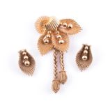 A 9ct yellow gold brooch and earring set in the style of Kutchinsky, of foliate seed pod design with