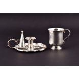 A George III silver chamberstick London 1822, by Robert Hennell II, with matched later snuffer (