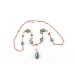 An early to mid 20th century 15ct yellow gold and turquoise necklace with six cage-set turquoise