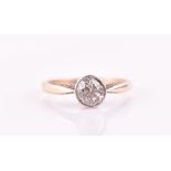 A 14ct yellow gold and solitaire diamond ring the round transitional-cut stone of approximately 0.70