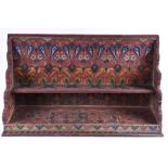 A painted wooden two-tier shelf  with Iznik style floral motifs, 39 cm high x 67 cm wide.