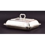 An Edward VII silver entree dish London 1904, by Thomas Bradbury & Sons, of shaped rectangular