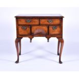 A Queen Anne herring banded burr walnut lowboy with quarter veneered top above two frieze drawers,