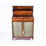 A Regency rosewood and brass chiffonier the top with graduated shelves surmounted with a pierced