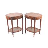 A pair of French Louis XVI style marble top side tables the oval tops with carved frieze above