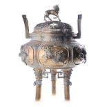A large late 19th / early 20th century Chinese bronze censer the pierced, domed lid with a
