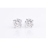 A pair of 18ct white gold and diamond solitaire ear studs set with round brilliant-cut diamonds of