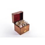 A small 19th century mahogany cased medicine chest of square form with campaign brass handles, the