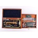 A late 19th century cased set of stomach pumping instruments by Down & Bros, London, with pump and