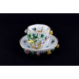 A Meissen 'Schneeballen' porcelain cup and saucer of naturalistic decor with encrusted flowers and