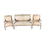 A French Louis XVI style salon suite comprising a two seater sofa and two armchairs, each