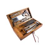 A 19th century Ferguson surgeon's field post mortem set in a fitted oak and brass mounted case, by