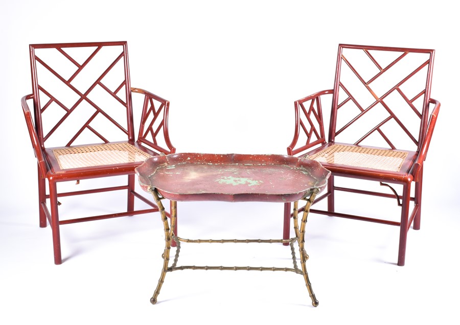 A pair of 20th century cockpen chairs with red painted frame and caned seat, each 88 cm high x 60 cm