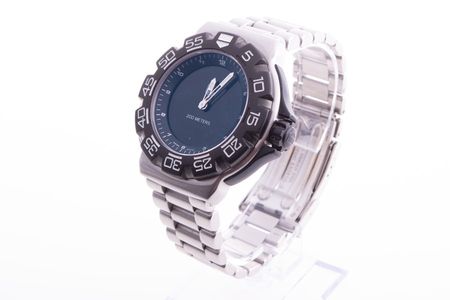 A Tag Heuer Digi 2000 digital stainless steel wristwatch the black semi-digital dial with analogue - Image 5 of 7