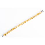 A silver and citrine bracelet set with mixed oval-cut citrines of approximately 23.0 carats