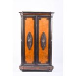 A Victorian period aesthetic style walnut and ebonised wood side cabinet with pierced half gallery