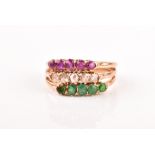 An unusual pink sapphire, diamond, and emerald ring (formed of three rings combined), set with old-