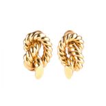 A pair of Italian yellow metal earrings of rope-twist form, stamped 750 (test as 18ct gold), with