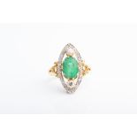 An 18ct yellow gold, diamond, and emerald ring the openwork marquise mount centred with a mixed