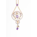 A yellow metal, amethyst, and pearl pendant the openwork mount set with split seed pearls and two