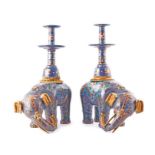 A pair of Chinese cloisonne elephant pricket candlesticks late Qing, modelled with polychrome