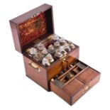 An early 19th century mahogany cased trunk style medicine chest by 'J&G Waugh, Chemists & Druggists,