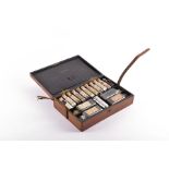 An early 20th century Army & Navy Co-operative Society field medical set contained in a leather