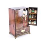 A fine quality Regency period figured mahogany medicine chest  with extensive brass inlay and