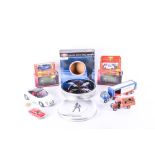 A small group of Corgi diecast models comprising a James Bond film canister gift set TY95903, two