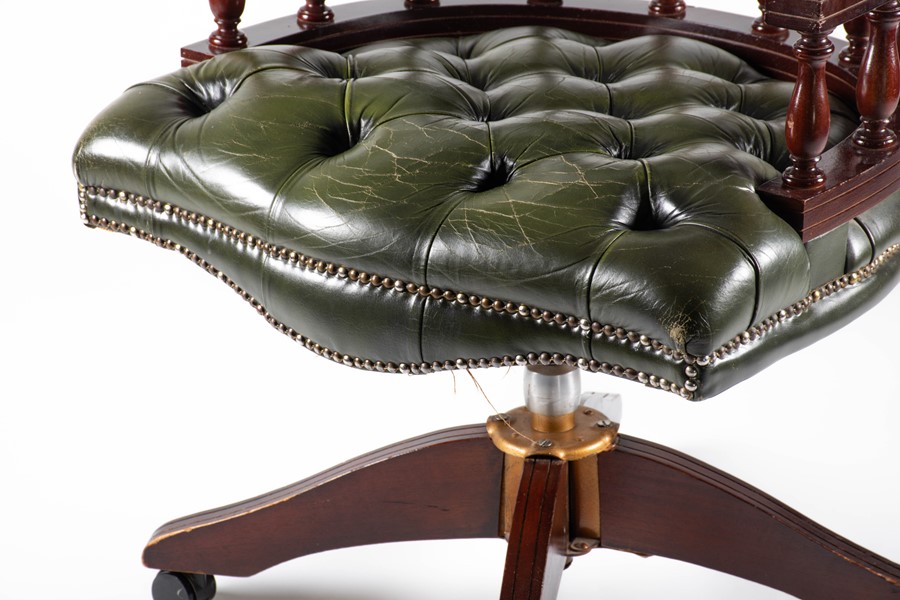 A 20th century mahogany captain's chair with green button leather upholstery, 62 cm wide x 88 cm - Image 7 of 14