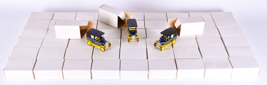 A collection of 57 boxed Dinky Toys Taxi models each modelled in blue and yellow, cast to the