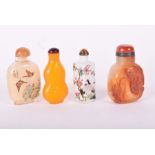 A Chinese carved agate snuff bottle along with one double gourded, one inside painted and