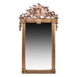 A French 18th century giltwood and gesso wall mirror possibly Louis XVI, the rectangular plate