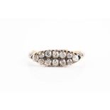 A yellow gold and old-cut diamond ring the navette-shaped mount set with twelve old-cut diamonds,