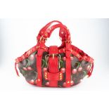 A Louis Vuitton cherry pattern Theda bag from the Cerise collection, cherry embossed monogram