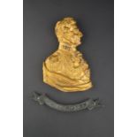 A 19th century gilt bronze relief casting of Wellington with name plaque, the bust 19 cm high. (2)