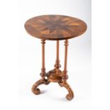 An early 19th century English specimen wood occasional table of circular form with inlaid