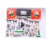 Two boxed Britains figures on horseback to include Queen Elizabeth II, together with a quantity of