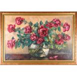 Laure Derby (XX) French depicting a bouquet of roses in a glass vase, signed lower left, oil on