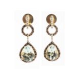 A pair of 14ct yellow gold, diamond, and prasiolite drop earrings the drops set with a mixed pear-