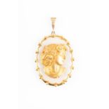 A fine and unusual diamond, agate, and yellow metal cameo pendant (unmarked, tests as gold), the