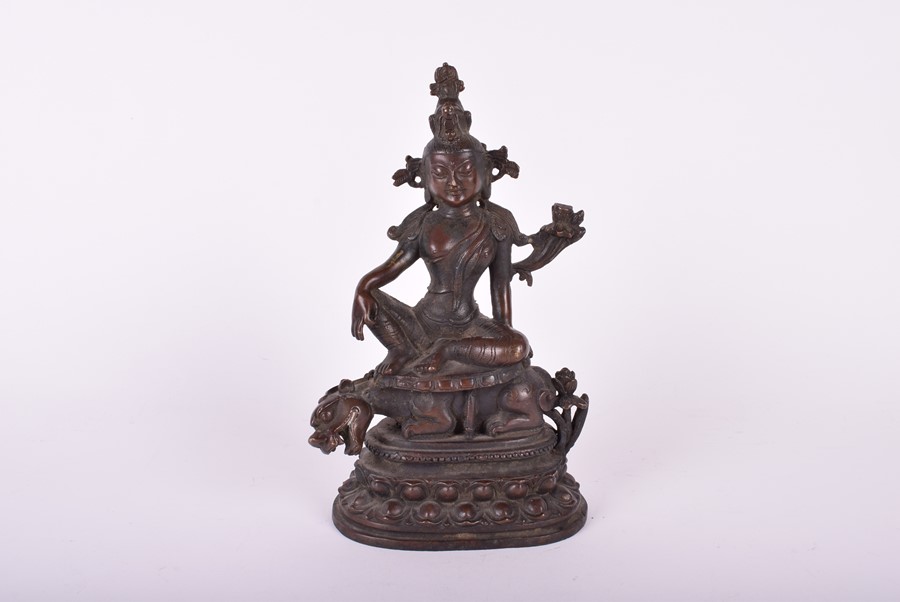 A South East Asian bronze deity, possibly Tara the goddess sits above a crouching guardian, raised - Image 5 of 5