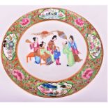 A early 19th century Chinese famille rose plate circa 1800, the border decorated with enameled