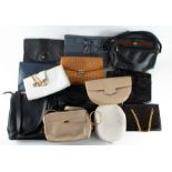 A group of various ladies handbags including a white leather christian Dior shoulder bag, two