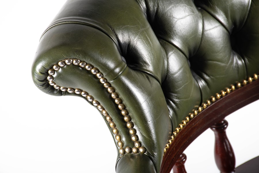 A 20th century mahogany captain's chair with green button leather upholstery, 62 cm wide x 88 cm - Image 3 of 14