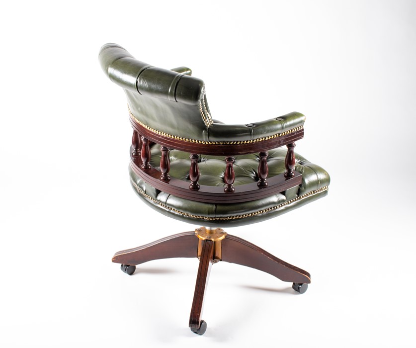 A 20th century mahogany captain's chair with green button leather upholstery, 62 cm wide x 88 cm - Image 4 of 14