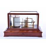 A 20th century mahogany cased barograph with a seven tier vacuum and lacquered brass mounts, the