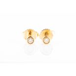 Elsa Peretti, for Tiffany & Co. A pair of yellow gold and diamond stud earrings from the By the Yard