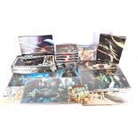 A group of vintage 1980s Star Wars jigsaw puzzles mostly completed and with boxes, together with two