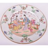 A Qianlong period famille rose decorated dish with central scene depicting an empress and her